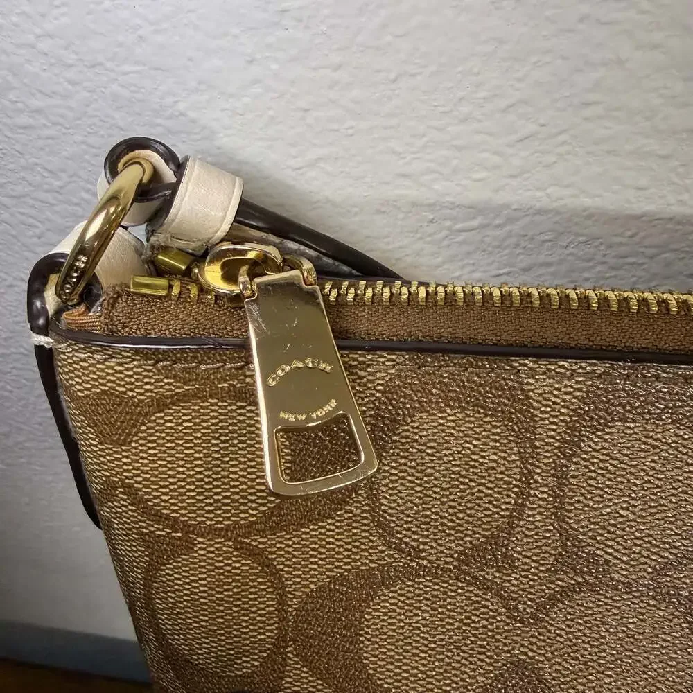 Coach Signature Coated Canvas Rowan File Bag Crossbody